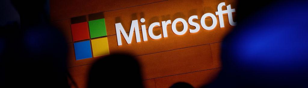 NEW YORK, NY &#8211; MAY 2: The Microsoft logo is illuminated on a wall during a Microsoft launch event to introduce the new Microsoft Surface laptop and Windows 10 S operating system, May 2, 2017 in New York City. The Windows 10 S operating system is geared toward the education market and is Microsoft&#8217;s answer to Google&#8217;s Chrome OS. (P...