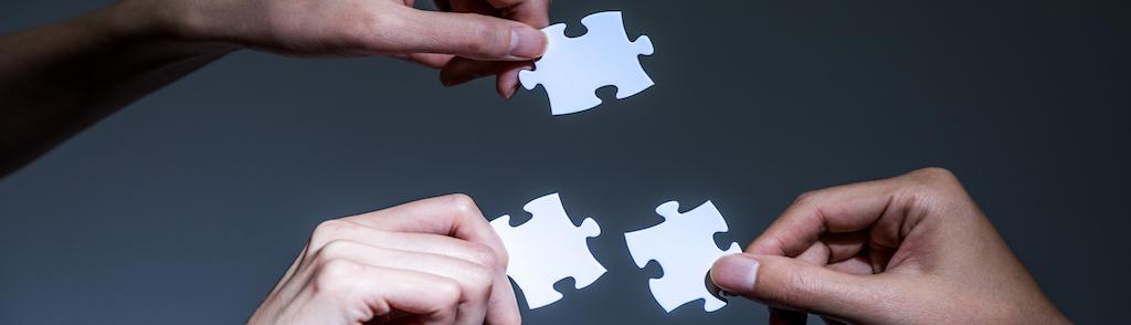 hands holding jigsaw puzzles, business to business, business matching concept